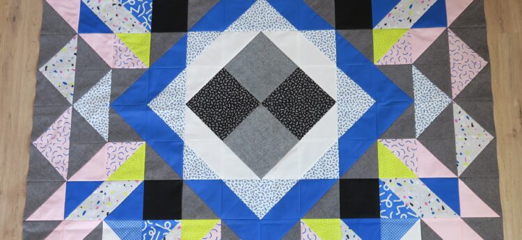 Luna Lovequilts - A finished quilt top - Diaspora pattern designed by psbquilts - Snap to Grid collection by Kimberly Kight