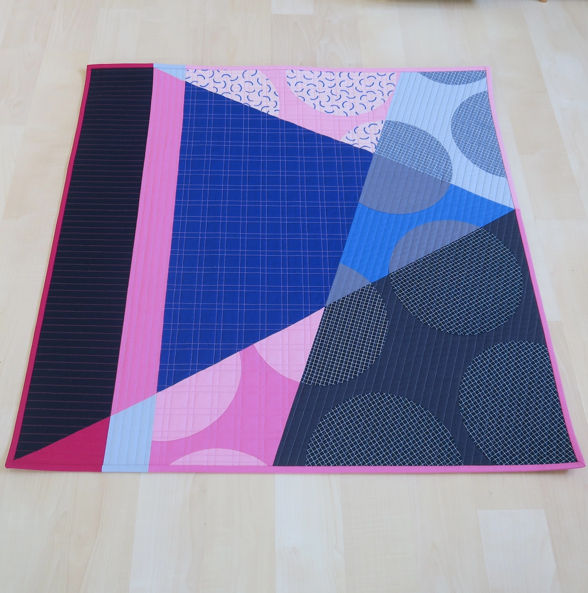 Luna Lovequilts - Quilt Photography - On the Floor with Distortion